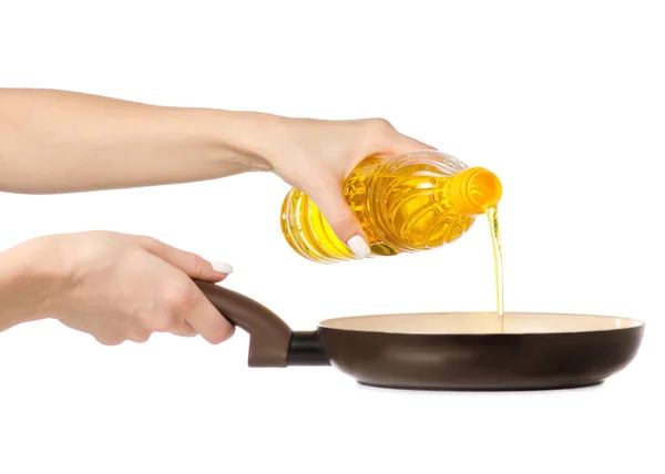 Sunflower oil pour into a frying pan — Stock Photo, Image