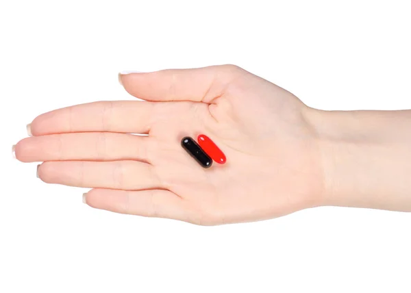 Two pills in a hand — Stock Photo, Image