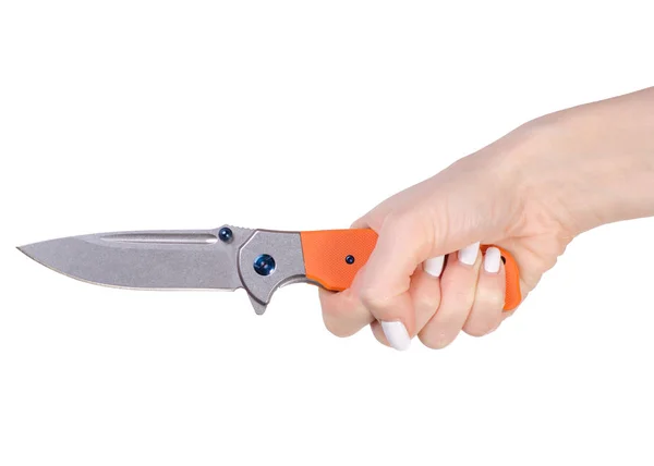 Cuchillo plegable con mango naranja en mano —  Fotos de Stock