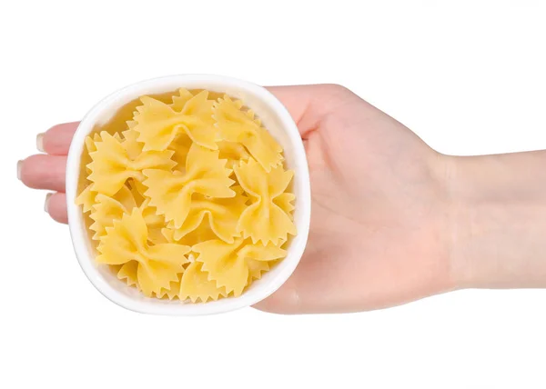 Macarrones arcos en un tazón en una mano — Foto de Stock