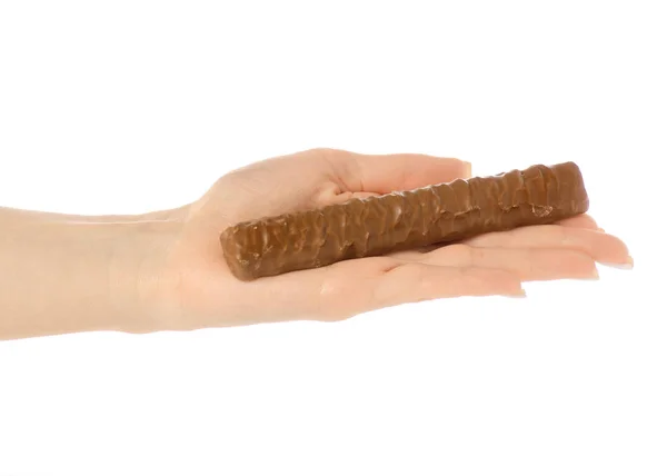 Шоколадная палка в руке — стоковое фото