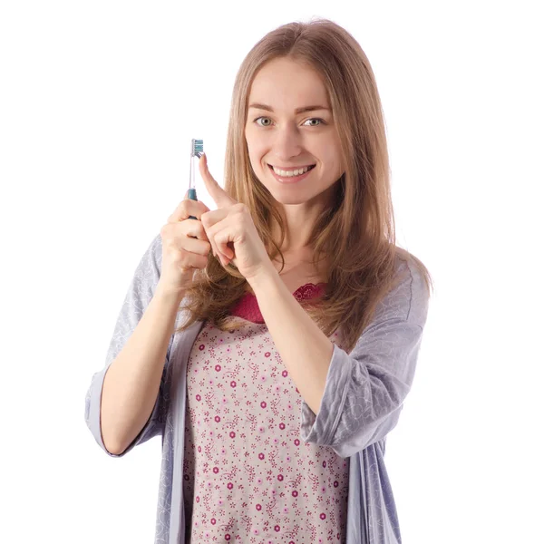 Jeune belle femme dans une brosse à peignoir pour nettoyer les dents — Photo