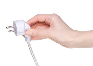 Elinde beyaz elektrik fişi