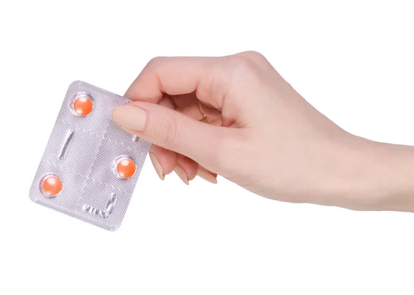 Pílulas de medicamentos em blister, comprimidos de medicamentos na mão, isolados — Fotografia de Stock