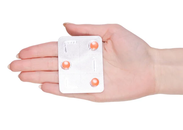 Lek tabletki w blistrze, tabletki leku w dłoni, na białym tle — Zdjęcie stockowe