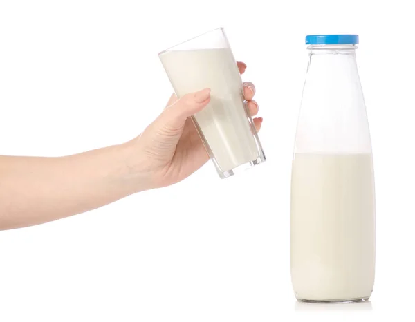 Una botella de leche un vaso de leche en las manos —  Fotos de Stock