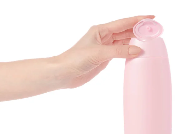Gel de chuveiro em frasco de plástico rosa na mão — Fotografia de Stock