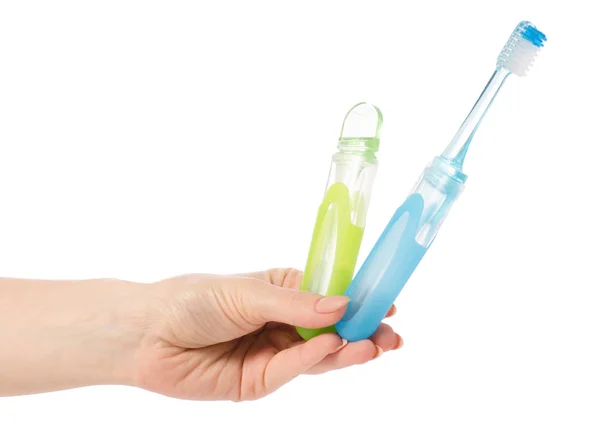 Two travel toothbrush in hand — Stock Photo, Image