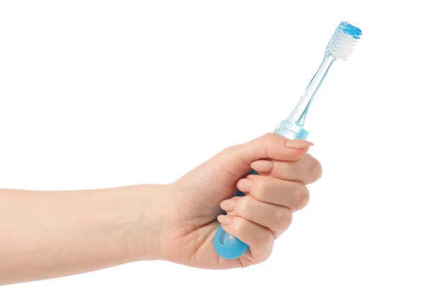 Travel blue toothbrush in hand — Stock Photo, Image