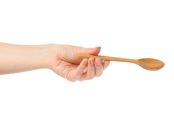 Wooden small spoon in hand — Stock Photo, Image