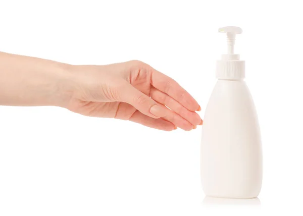 White soap bottle with dispenser in hand — Stock Photo, Image