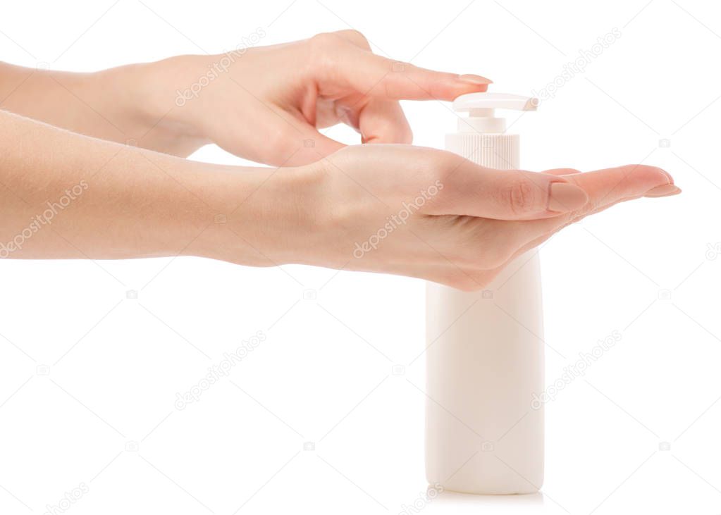 White soap bottle with dispenser in hand