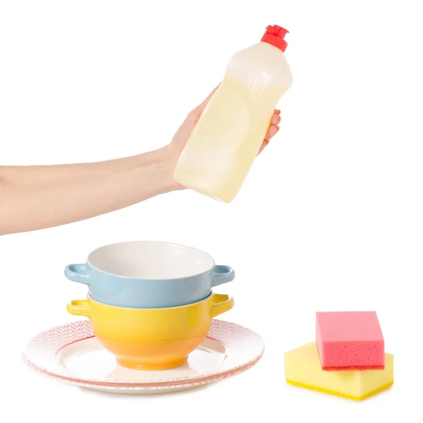Detergente para utensilios en mano y esponjas — Foto de Stock