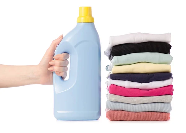 Pila de ropa Polvo líquido en la mano — Foto de Stock