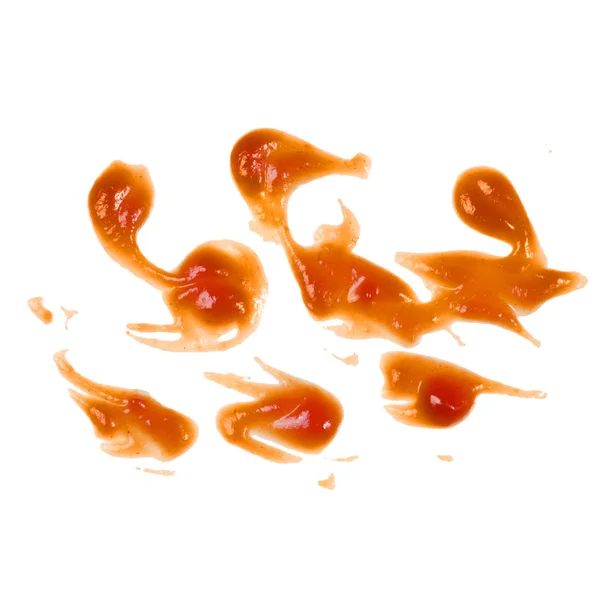 Ketchup vermelho espirra isolado — Fotografia de Stock