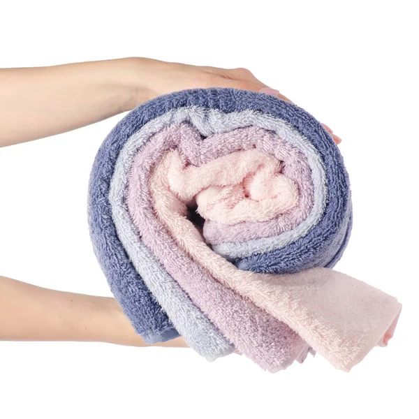 Stos ręczników różowy niebieski rolka w ręku — Zdjęcie stockowe