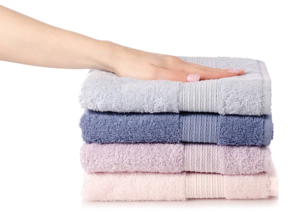 A stack of towels pink blue in hand — Stock Photo, Image