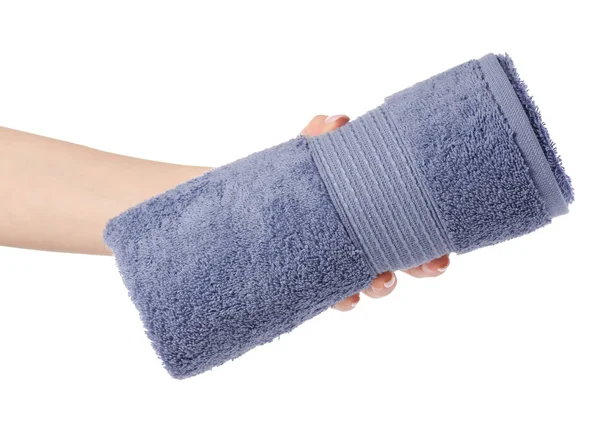 O rolo de toalha cinza azul na mão — Fotografia de Stock