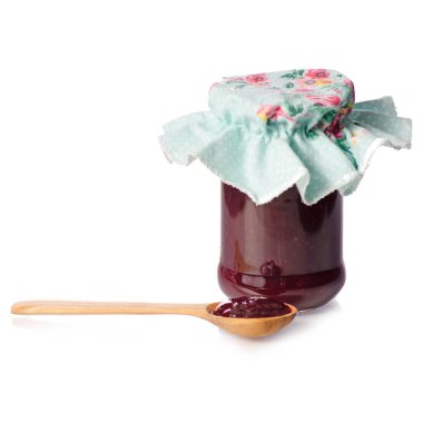 Bir kavanoz tahta kaşık içinde Ahududu reçeli