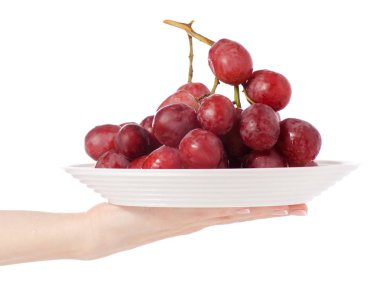 Elinde bir tabak içinde üzüm pembe