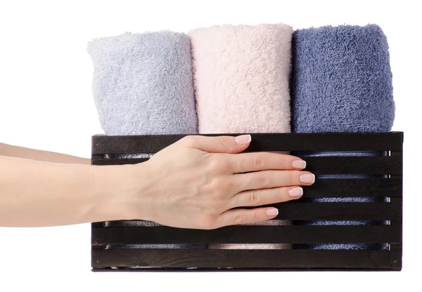 Toalhas cor definida em uma caixa de banho na mão — Fotografia de Stock