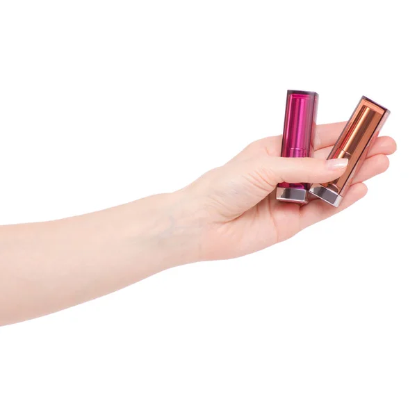 Zwei Lippenstifte rosa rot in der Hand — Stockfoto