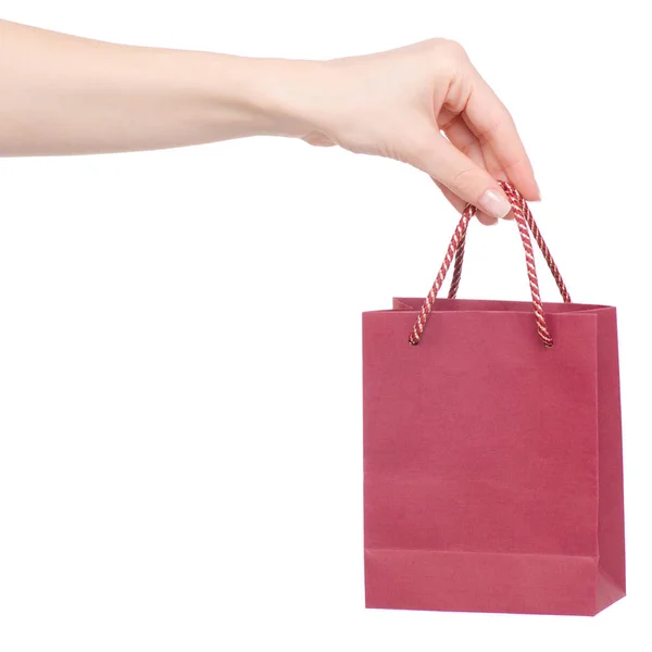 Cardboard red bag package in hand — Stock Photo, Image