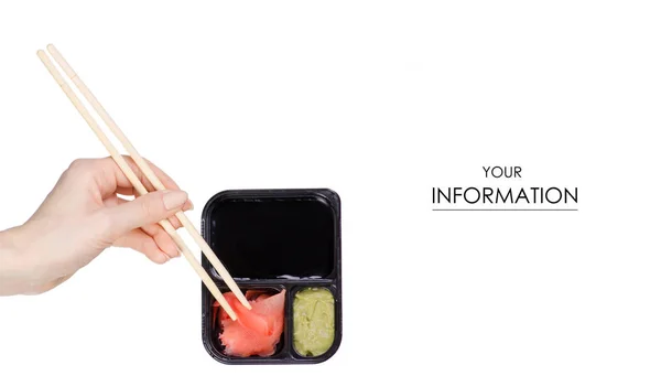 Tyčinky pro sushi v ruce sójová omáčka, zázvor wasabi vzor — Stock fotografie