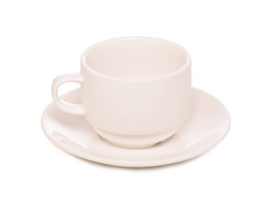 Beyaz fincan ve çay tabağı