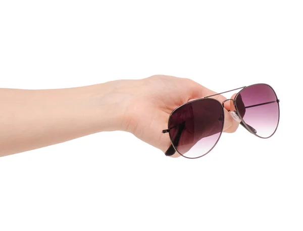 Vrouwelijke zonnebril in hand — Stockfoto