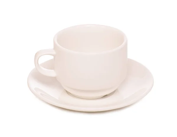 Белая чашка и блюдце — стоковое фото