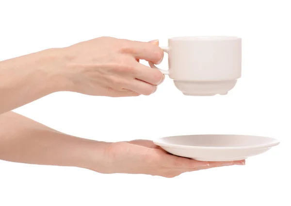 Beyaz Kupası ve elinde fincan tabağı — Stok fotoğraf