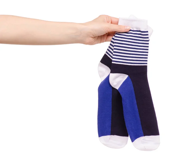 Socks in hand white blue striped — Stock Photo, Image