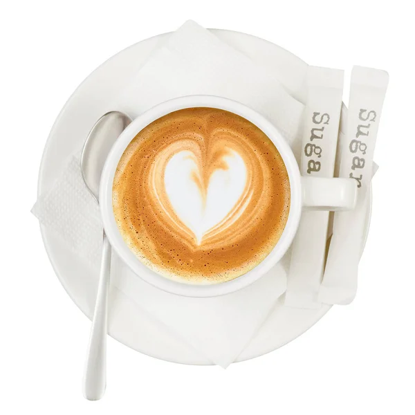 Copa blanca y platillo café capuchino corazón azúcar palos cuchara — Foto de Stock