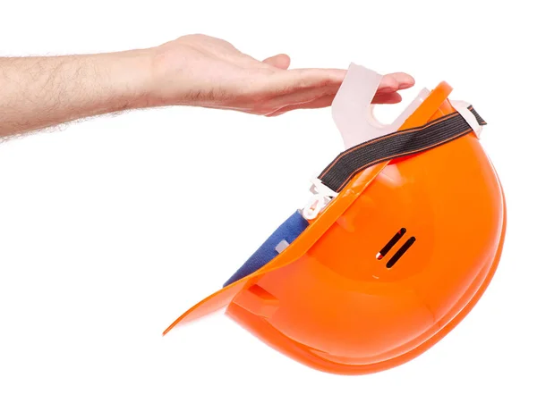 Oranžové Pánské helmy v mužské ruce — Stock fotografie