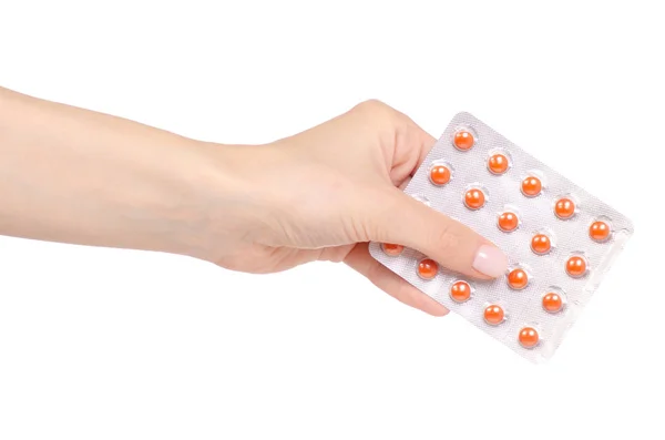 Kobiece ręka trzyma tabletek w blistrze medycyny — Zdjęcie stockowe