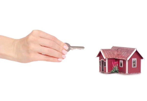 Pequeña casa con llaves en la mano — Foto de Stock