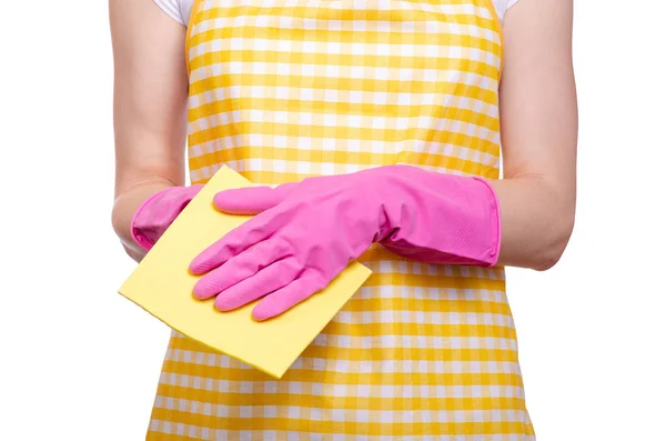 Femme dans un tablier dans les mains de gants de nettoyage chiffon — Photo