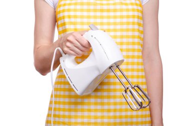 Kadın elinde elektrikli Mutfak Mikser önlük