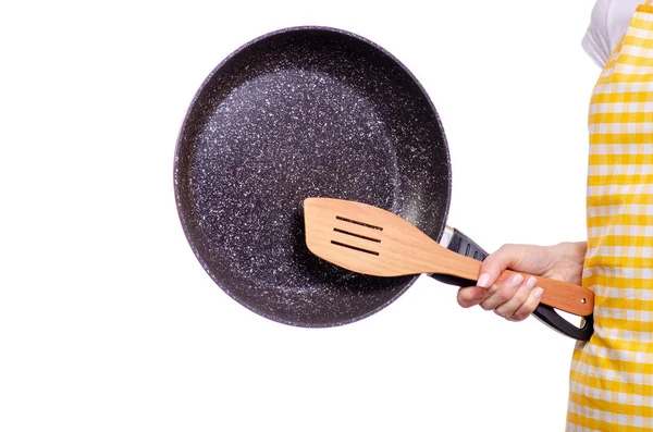 Vrouw in schort girosaldi frituren pan- en -keuken spatel — Stockfoto