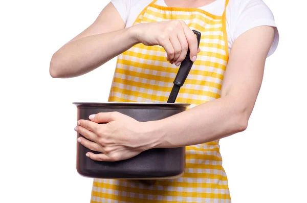 Жінка з фартухом в руці кухонний ковток і каструля — стокове фото