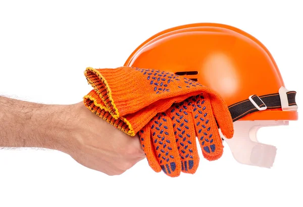 Casco de hombre naranja mano de hombre en guante —  Fotos de Stock