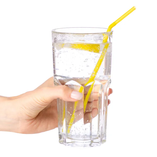 Üveg ásványvíz, citrom a kezében — Stock Fotó