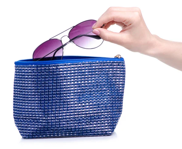 Sunglasses put in a cosmetic bag — Stock Photo, Image