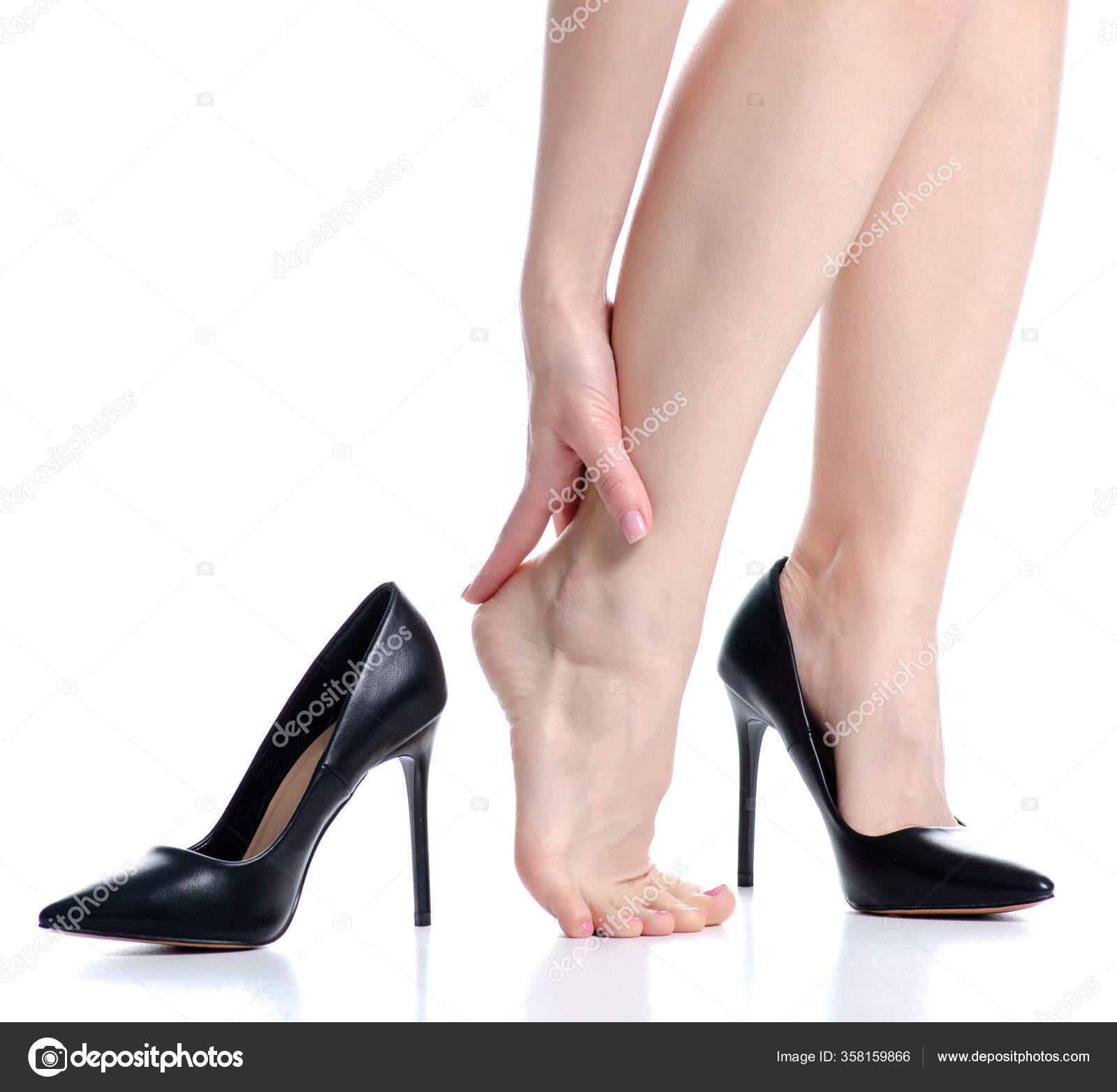 Female legs black high heels pain Stock Photo by ©Evgenyjs1 358159866
