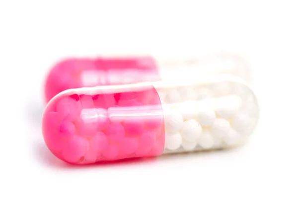 Pink white capsules medicine pharmasy — Stock Photo, Image