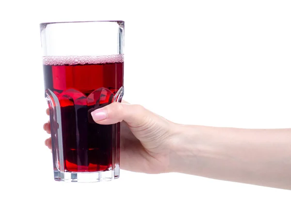 Cherry juice in a glass in hand — Stock Photo, Image