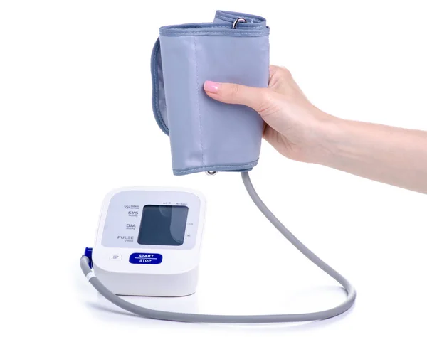 Digital blood pressure monitor electric tonometer in hand — Stock Photo, Image