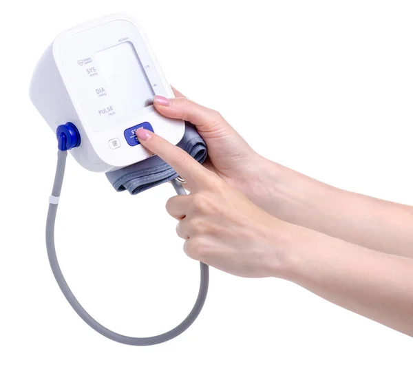 Monitor digital de presión arterial tonómetro eléctrico en la mano —  Fotos de Stock