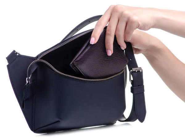 Black leather waist bag and purse in hand — Stock Photo, Image